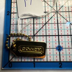 Coach Gold Metal Hangtag